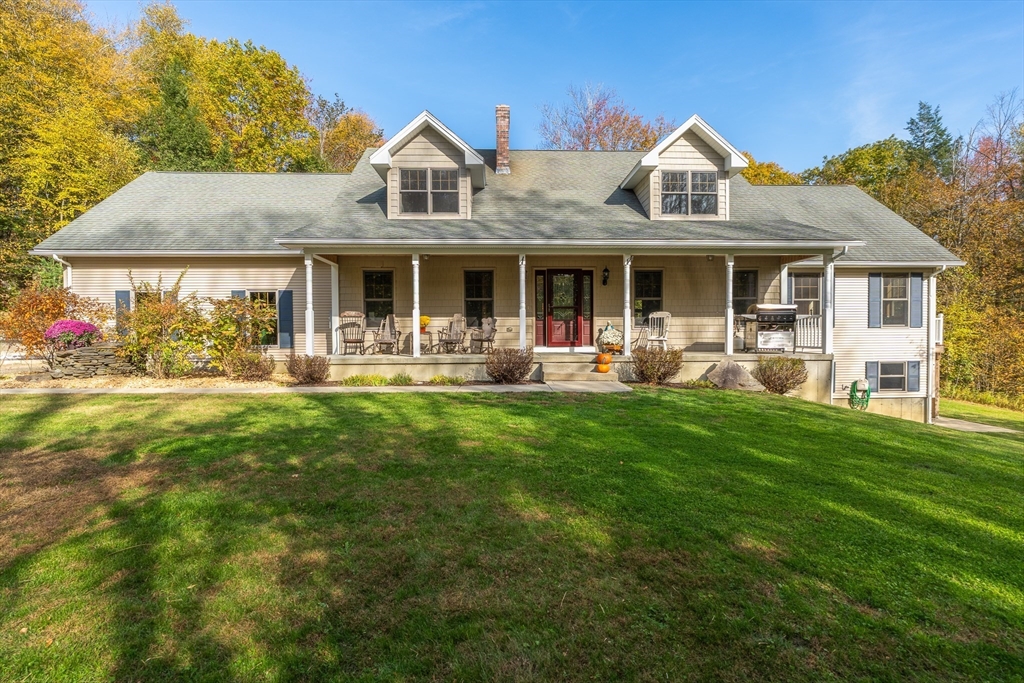 254 Bryant Street Chesterfield, MA 01012 - Photo 2 of 41 a front view of a house with garden