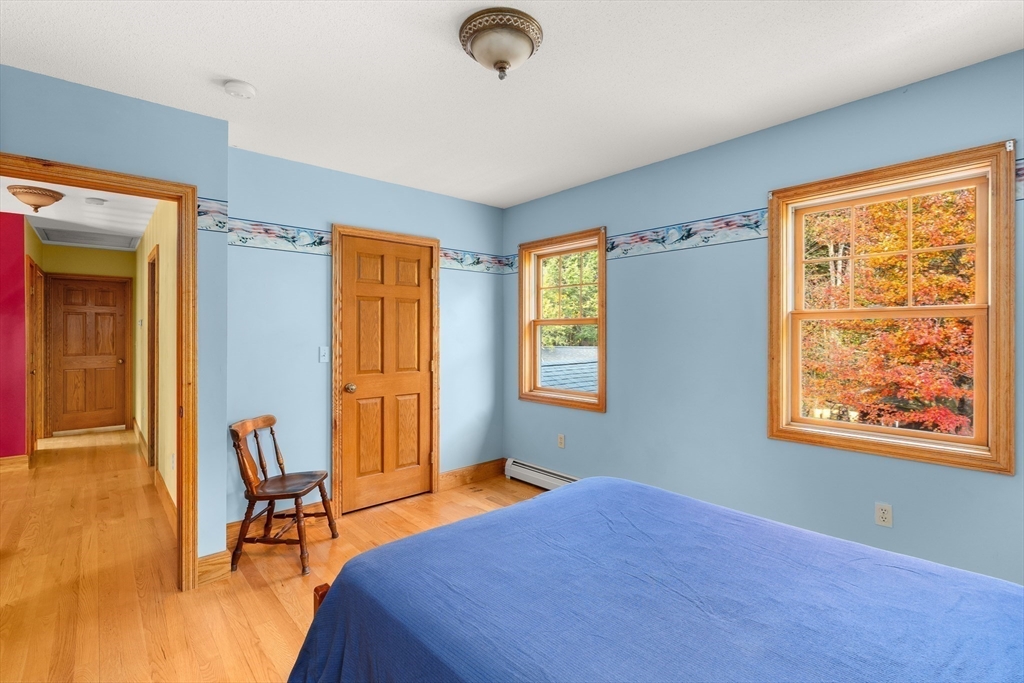 254 Bryant Street Chesterfield, MA 01012 - Photo 29 of 41 a bedroom with a bed and a window