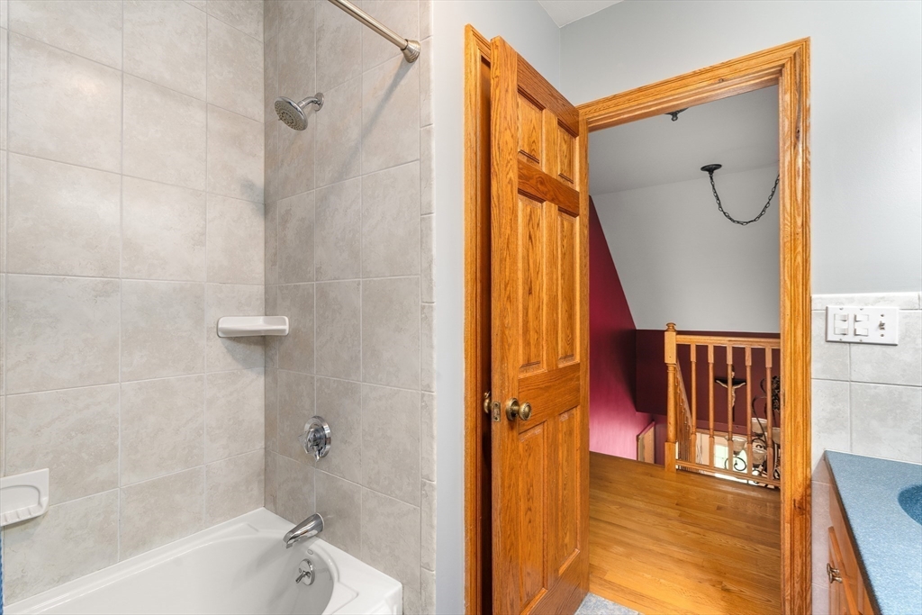 254 Bryant Street Chesterfield, MA 01012 - Photo 33 of 41 a bathroom with a tub and a shower