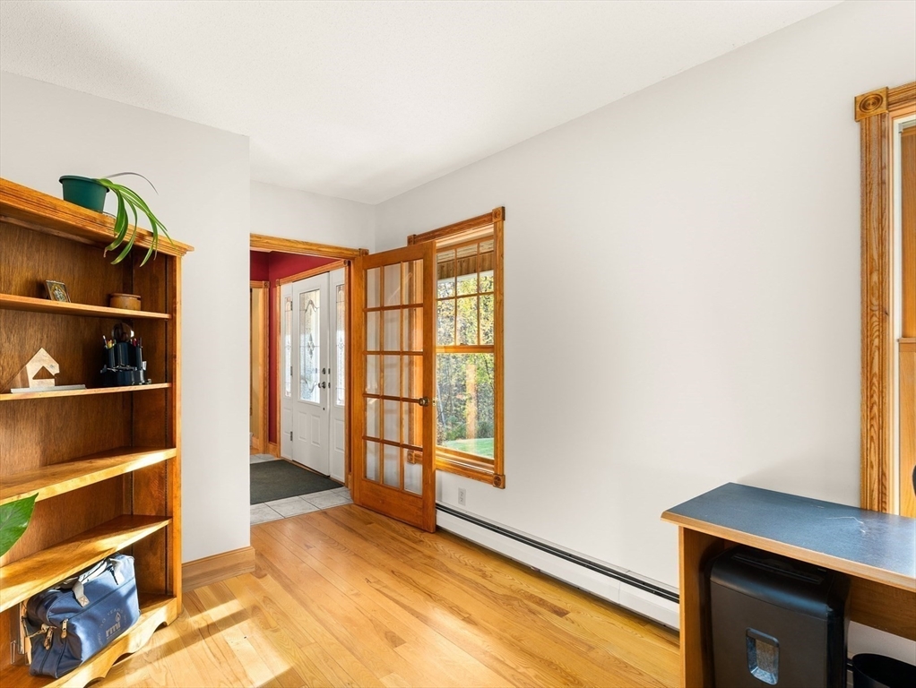 254 Bryant Street Chesterfield, MA 01012 - Photo 7 of 41 a view of room with window and shelf