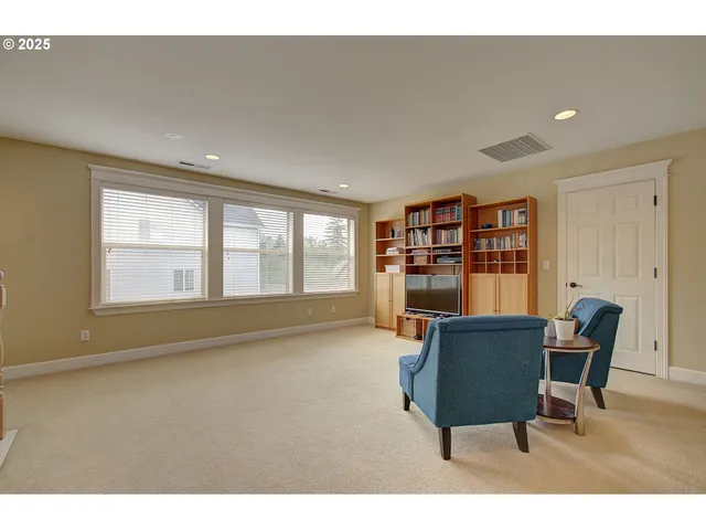 a workspace with furniture and window