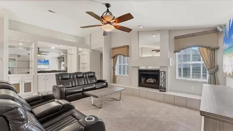 a bathroom with a sink vanity and mirror