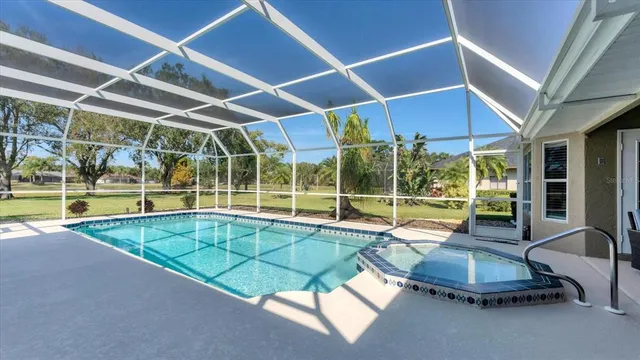 a view of a swimming pool with a porch