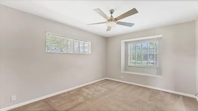 a view of a livingroom with furniture window and outside view