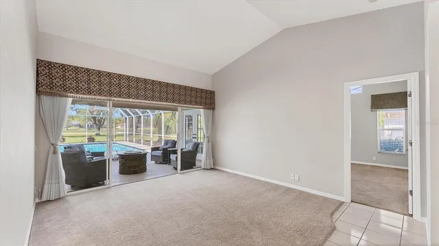 a kitchen with white cabinets stainless steel appliances and sink