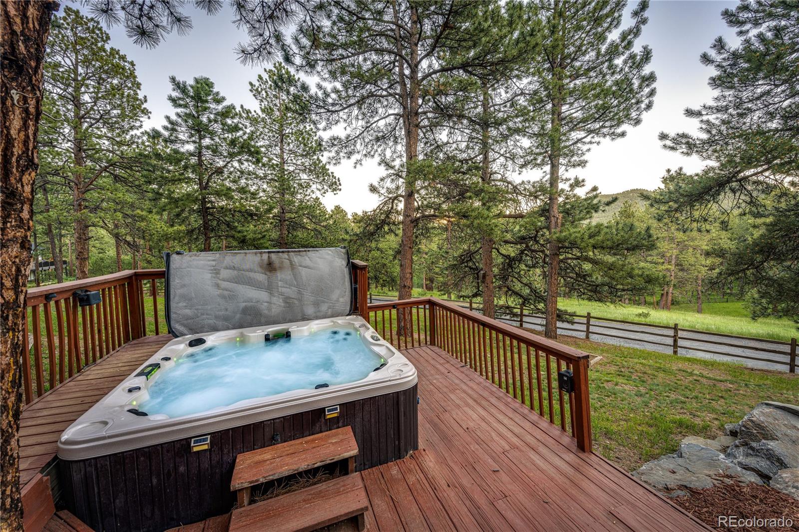 272 Greystone Road Evergreen, CO 80439 - Photo 35 of 40 a view from deck having patio