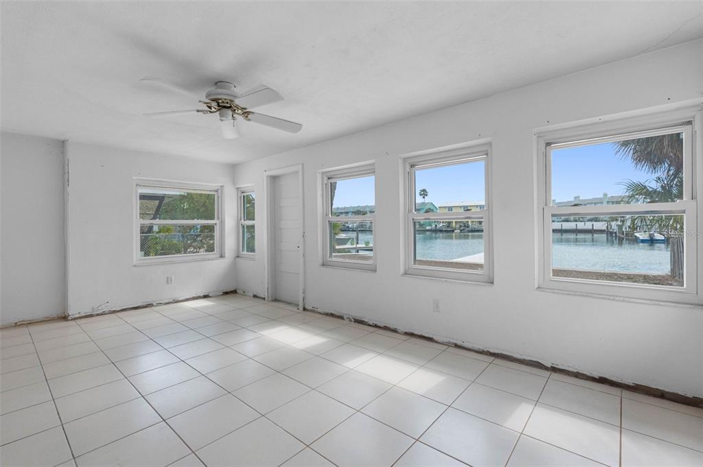 307 Bahia Vista Drive Indian Rocks Beach, FL 33785 - Photo 21 of 26 a view of an empty room with a window