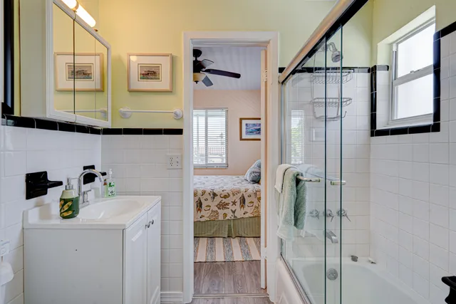 a bathroom with a sink and a mirror