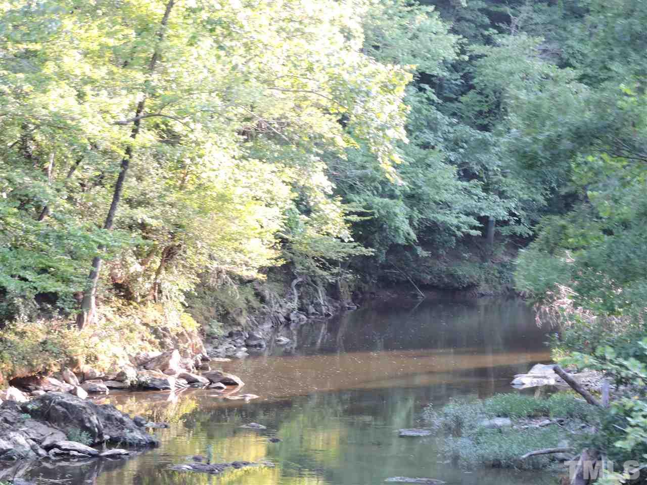 7.94-ac Rassie Crabtree Road Rougemont, NC 27572 - Photo 6 of 8 a view of a lake with mountain