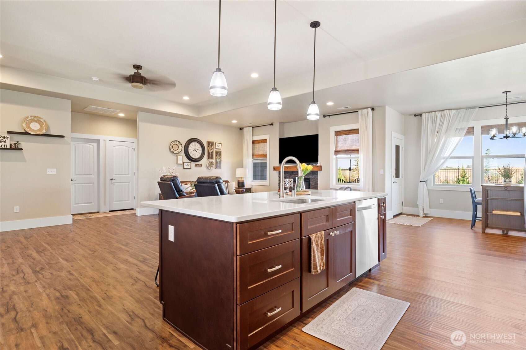 8125 Dune Lake Road Southeast Moses Lake, WA 98837 - Photo 17 of 40 a large kitchen with kitchen island a large island in it