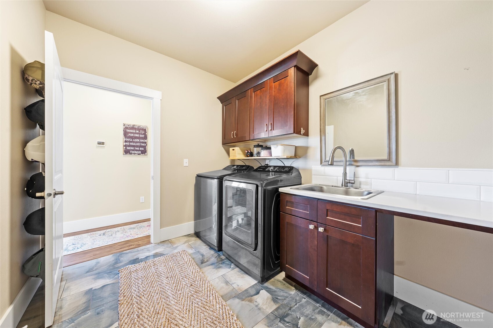 8125 Dune Lake Road Southeast Moses Lake, WA 98837 - Photo 27 of 40 a kitchen with stainless steel appliances granite countertop a sink stove and refrigerator