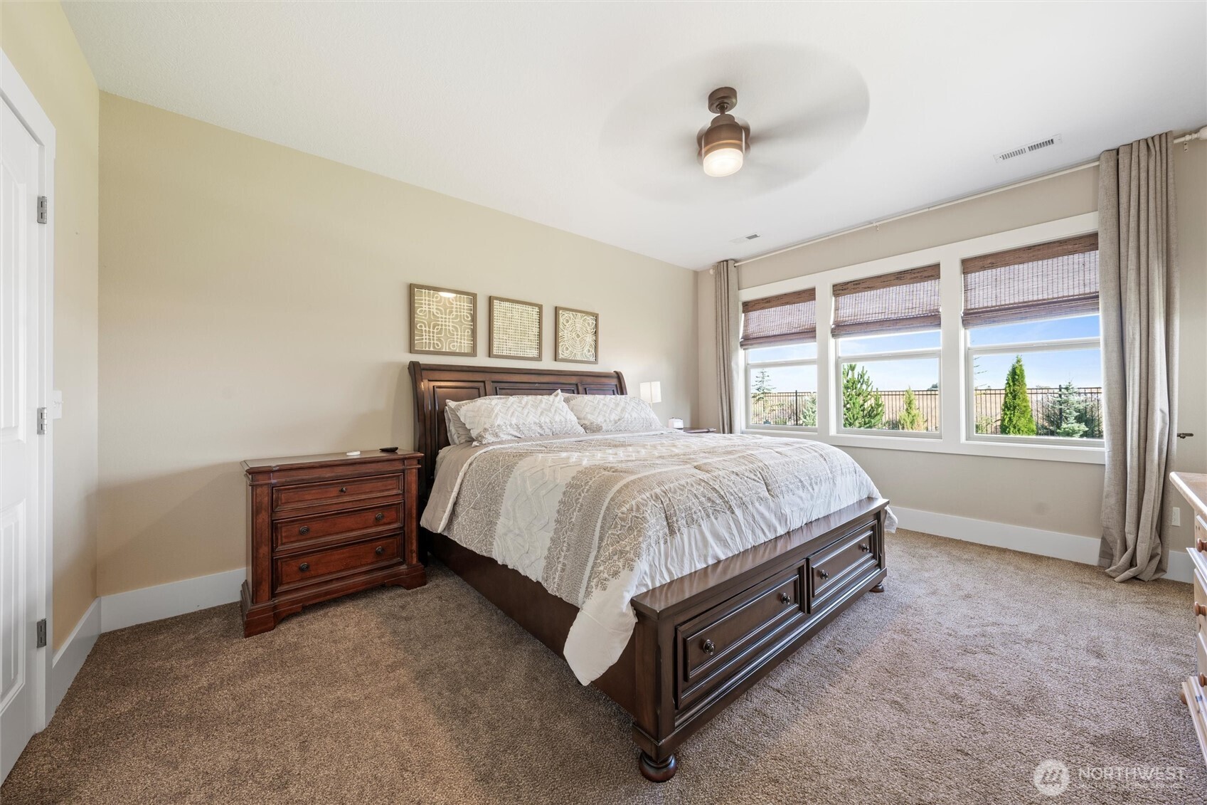 8125 Dune Lake Road Southeast Moses Lake, WA 98837 - Photo 30 of 40 a bed sitting in a bedroom next to a window