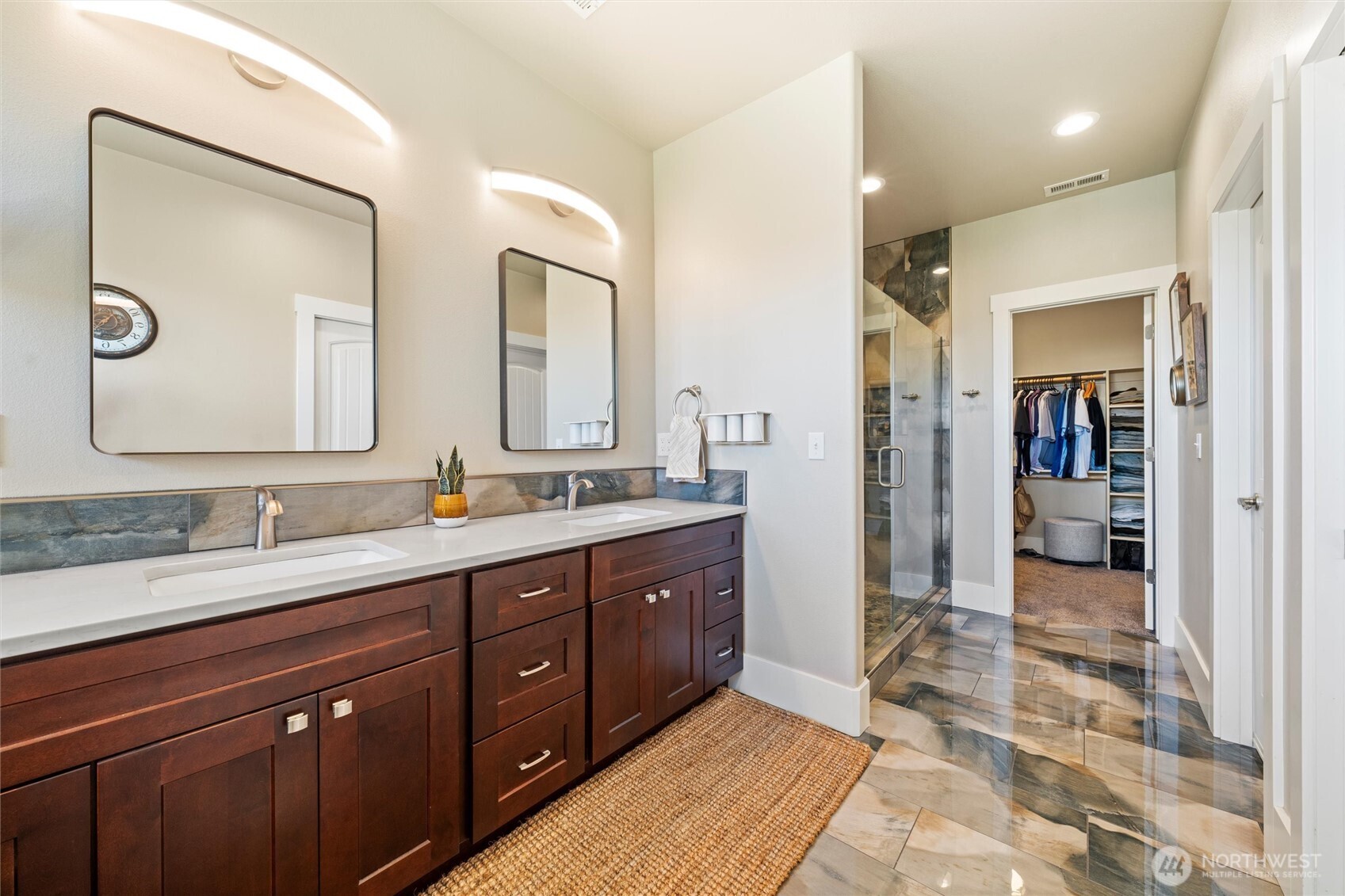 8125 Dune Lake Road Southeast Moses Lake, WA 98837 - Photo 33 of 40 a spacious bathroom with a double vanity sink mirror and double