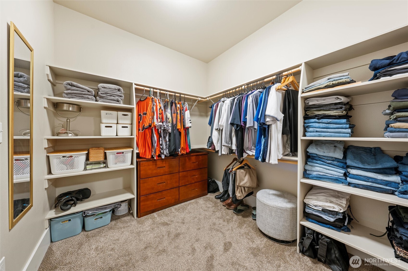 8125 Dune Lake Road Southeast Moses Lake, WA 98837 - Photo 35 of 40 a view of walk in closet with clothes and shoes