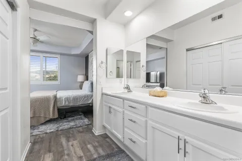 a bathroom with a shower and a toilet