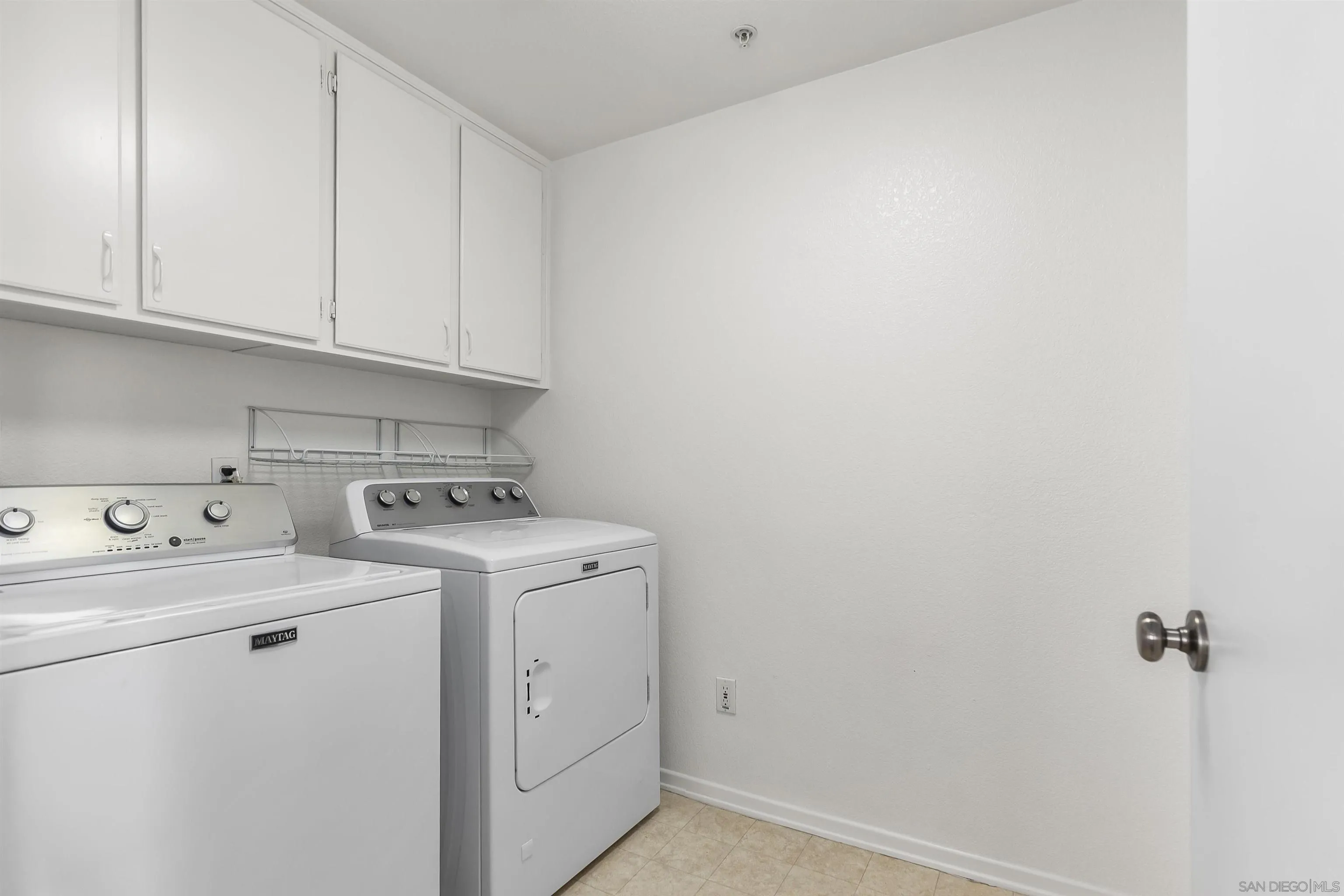 3177 Dehesa Road El Cajon, CA 92019 - Photo 29 of 55 a view of storage and utility room with washer and dryer