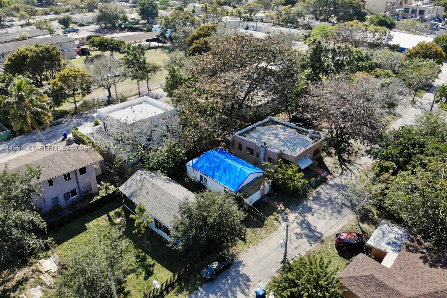 3748 Washington Avenue Miami, FL 33133 - Photo 11 of 15 an aerial view of a house with a garden