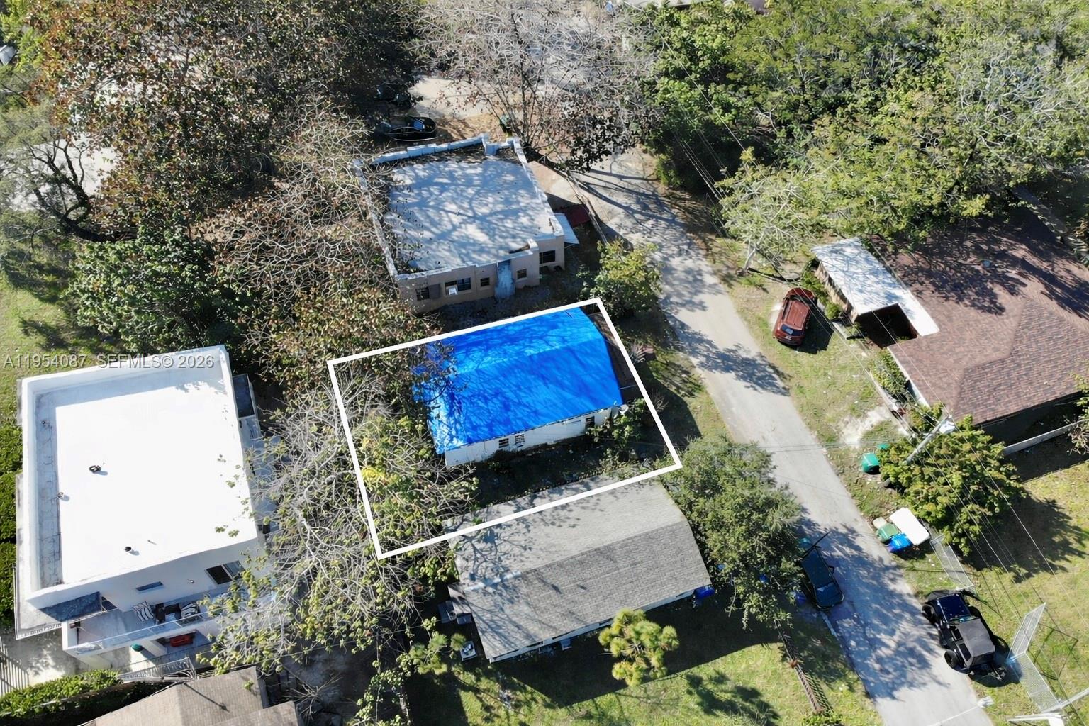 3748 Washington Avenue Miami, FL 33133 - Photo 13 of 15 an aerial view of a house with outdoor space