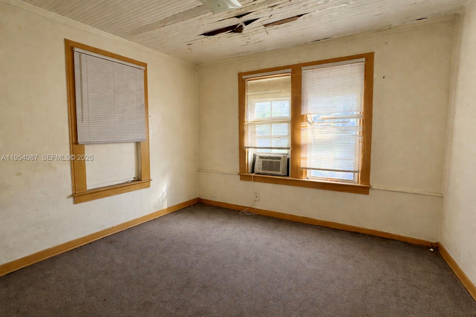 3748 Washington Avenue Miami, FL 33133 - Photo 7 of 15 an empty room with a window