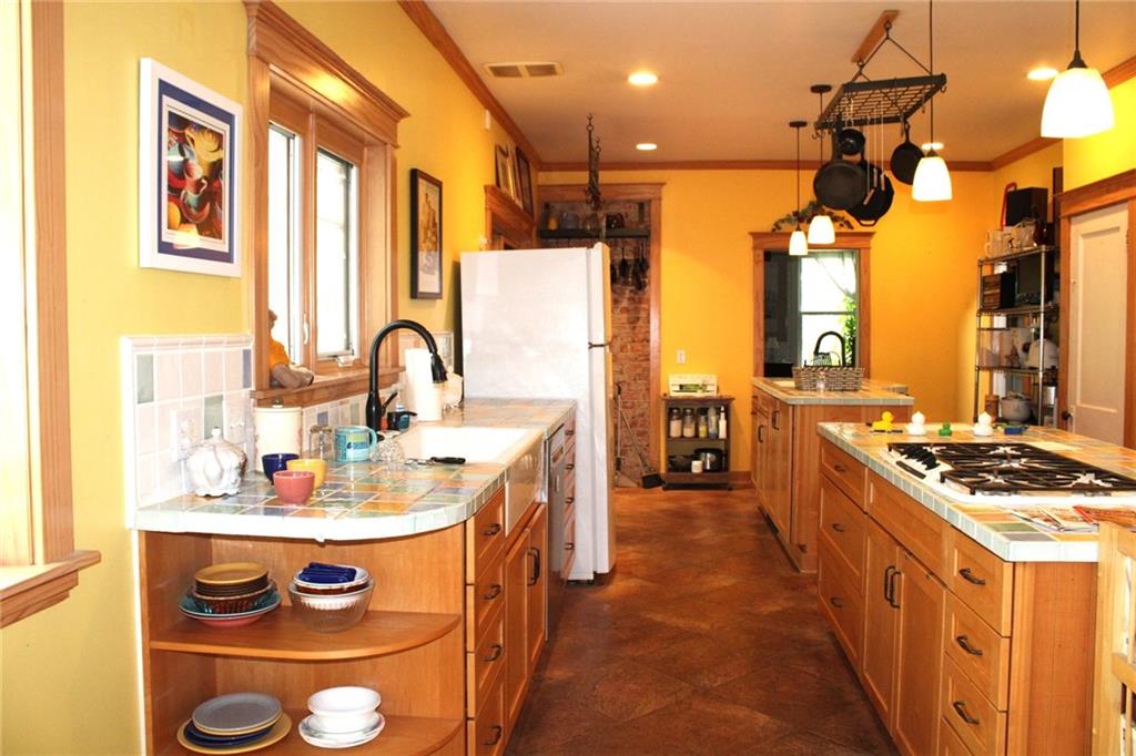200 School Street Pittsburgh, PA 15205 - Photo 13 of 46 a kitchen with a appliances and cabinets