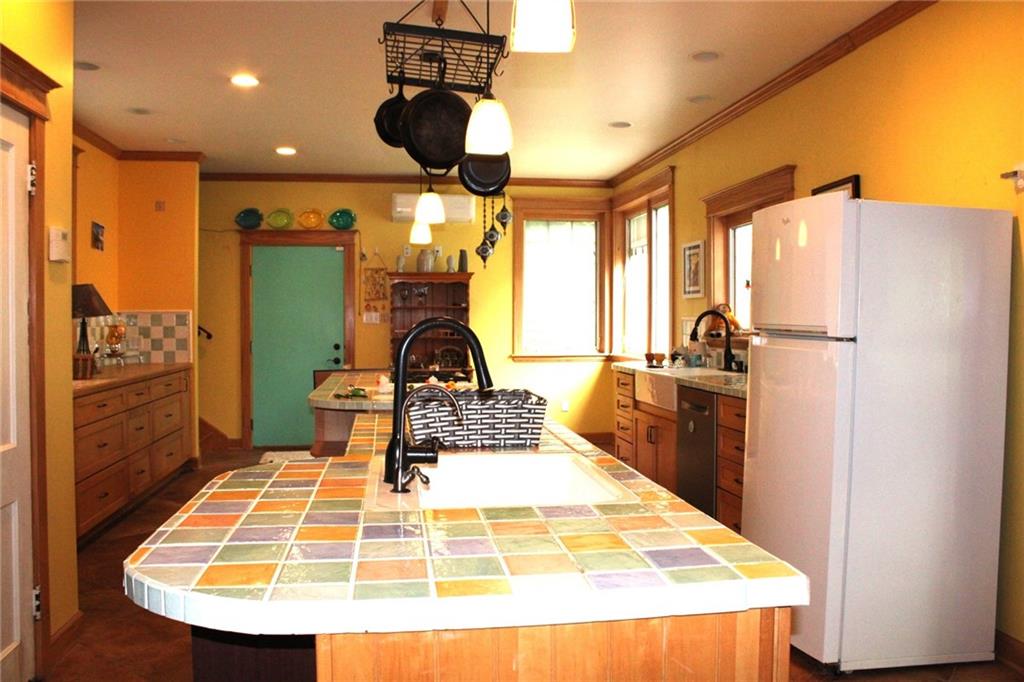 200 School Street Pittsburgh, PA 15205 - Photo 14 of 46 a view of a kitchen with a sink and wooden floor