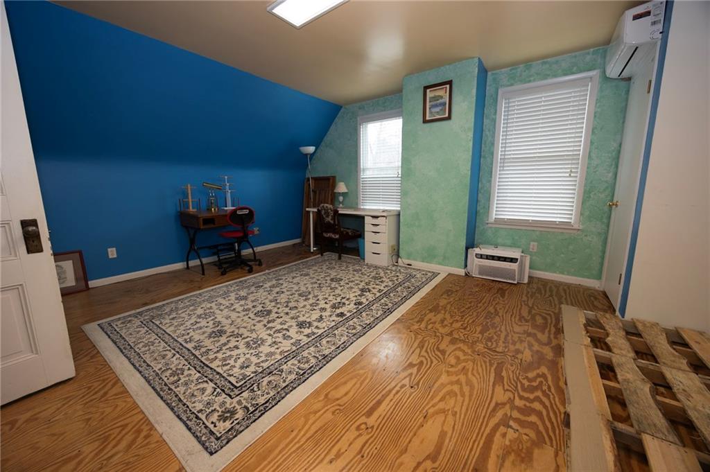 200 School Street Pittsburgh, PA 15205 - Photo 27 of 46 a bedroom with a bed and a dresser in it