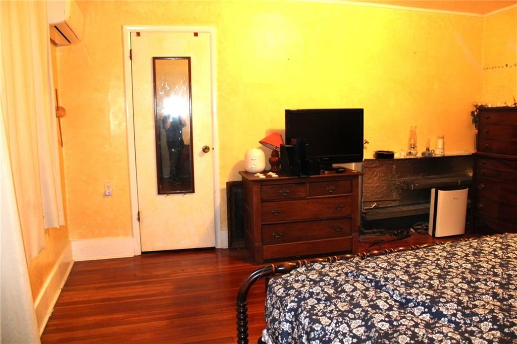 200 School Street Pittsburgh, PA 15205 - Photo 35 of 46 a bedroom with a bed and chair