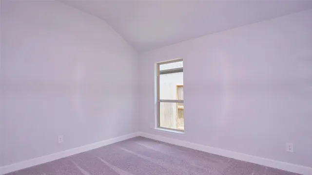 a bathroom with a tub and shower