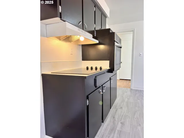 a kitchen view with a sink