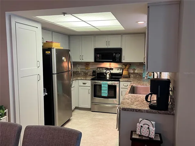 $275,000 | 2210 Utopian Drive East, Unit 214, Clearwater, FL 33763