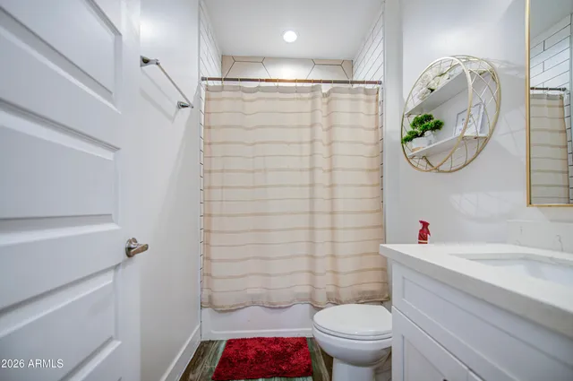 a view of a road with an ocean view