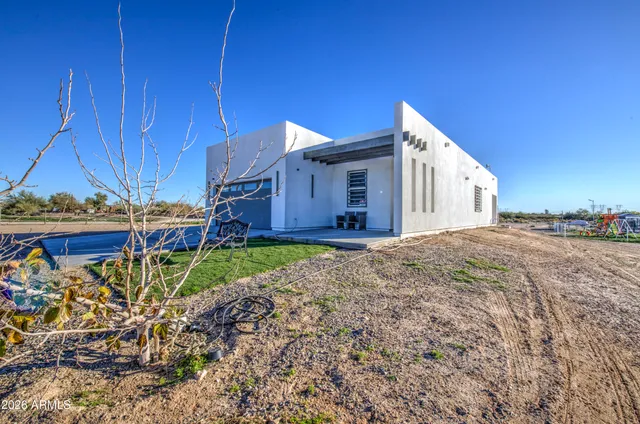 a view of a kitchen from the hallway