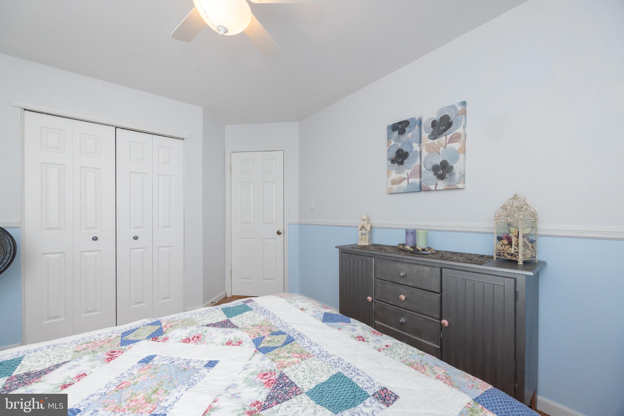 33 Skyview Way Newtown, PA 18940 - Photo 24 of 32 Serene bedroom with soft blue hues.