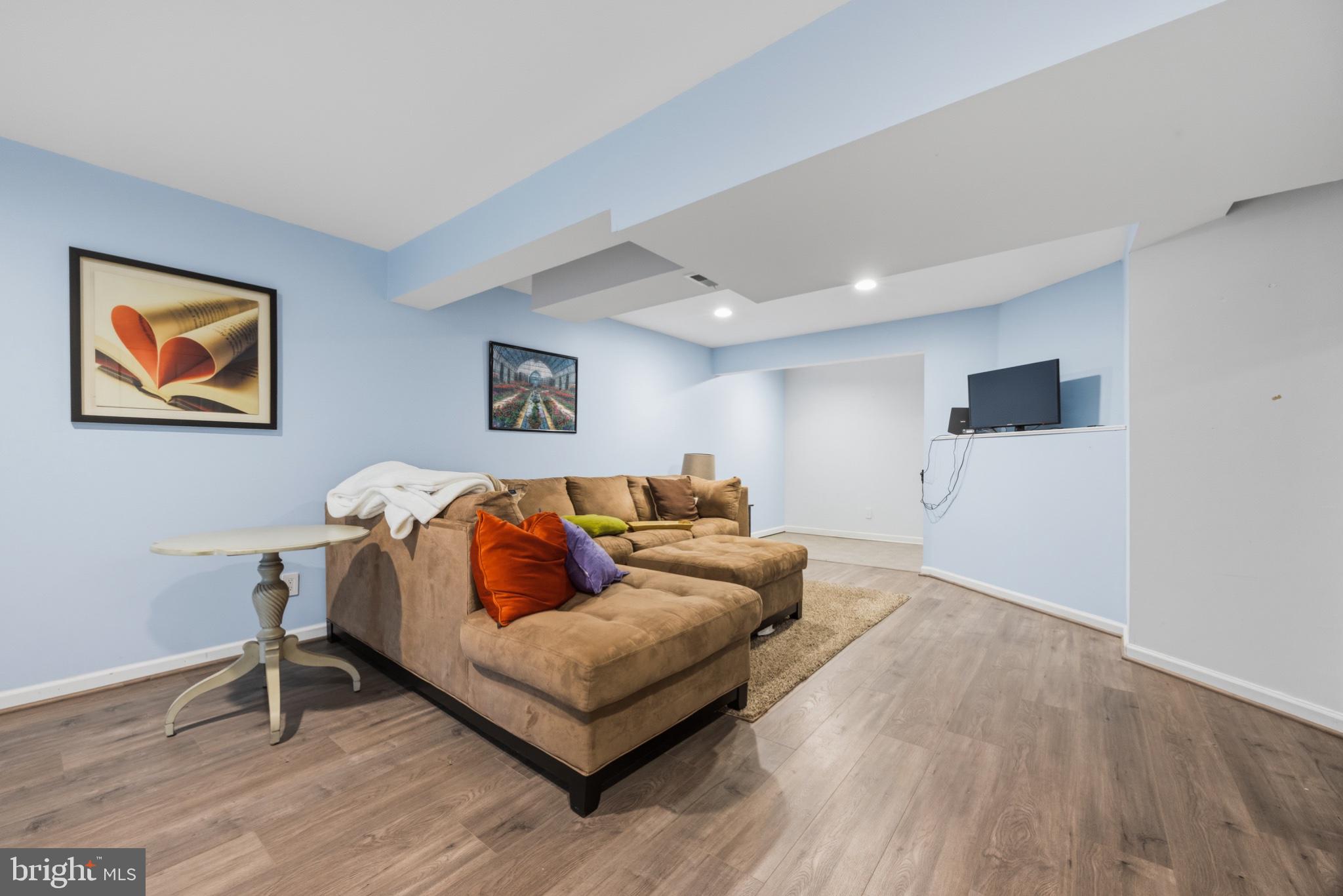 33 Skyview Way Newtown, PA 18940 - Photo 26 of 32 Cozy basement retreat with soft hues.