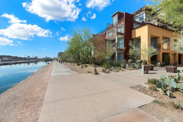 a view of a building with a yard