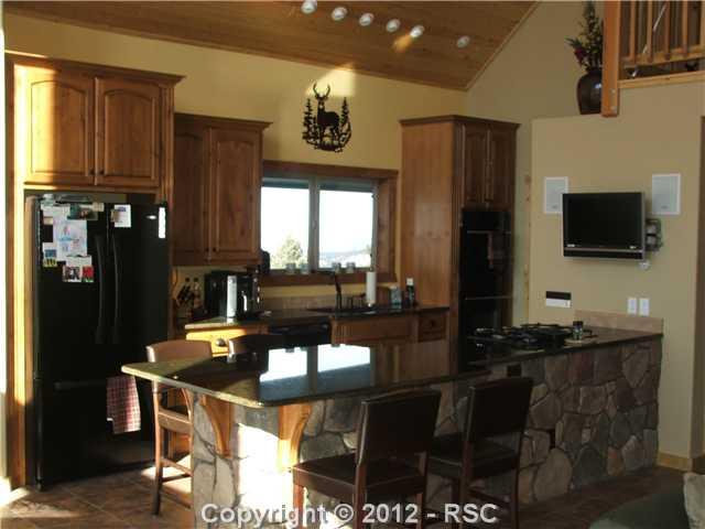 2397 Rampart Range Road Woodland Park, CO 80863 - Photo 11 of 14 An awesome kitchen with all the upgrades.