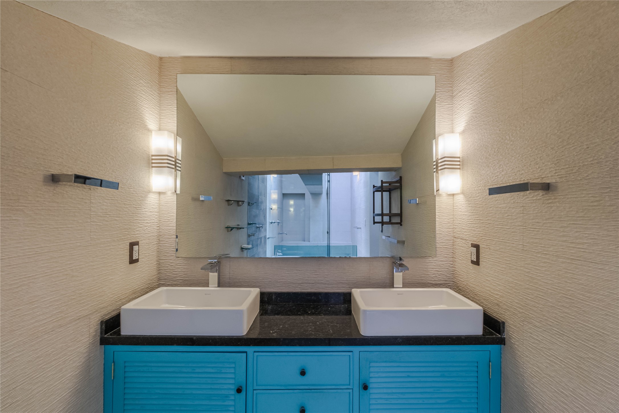 10 Cerrada Loma Nevada Remsenburg, NV 11960 - Photo 2 of 50 a bathroom with a granite countertop sink and a mirror