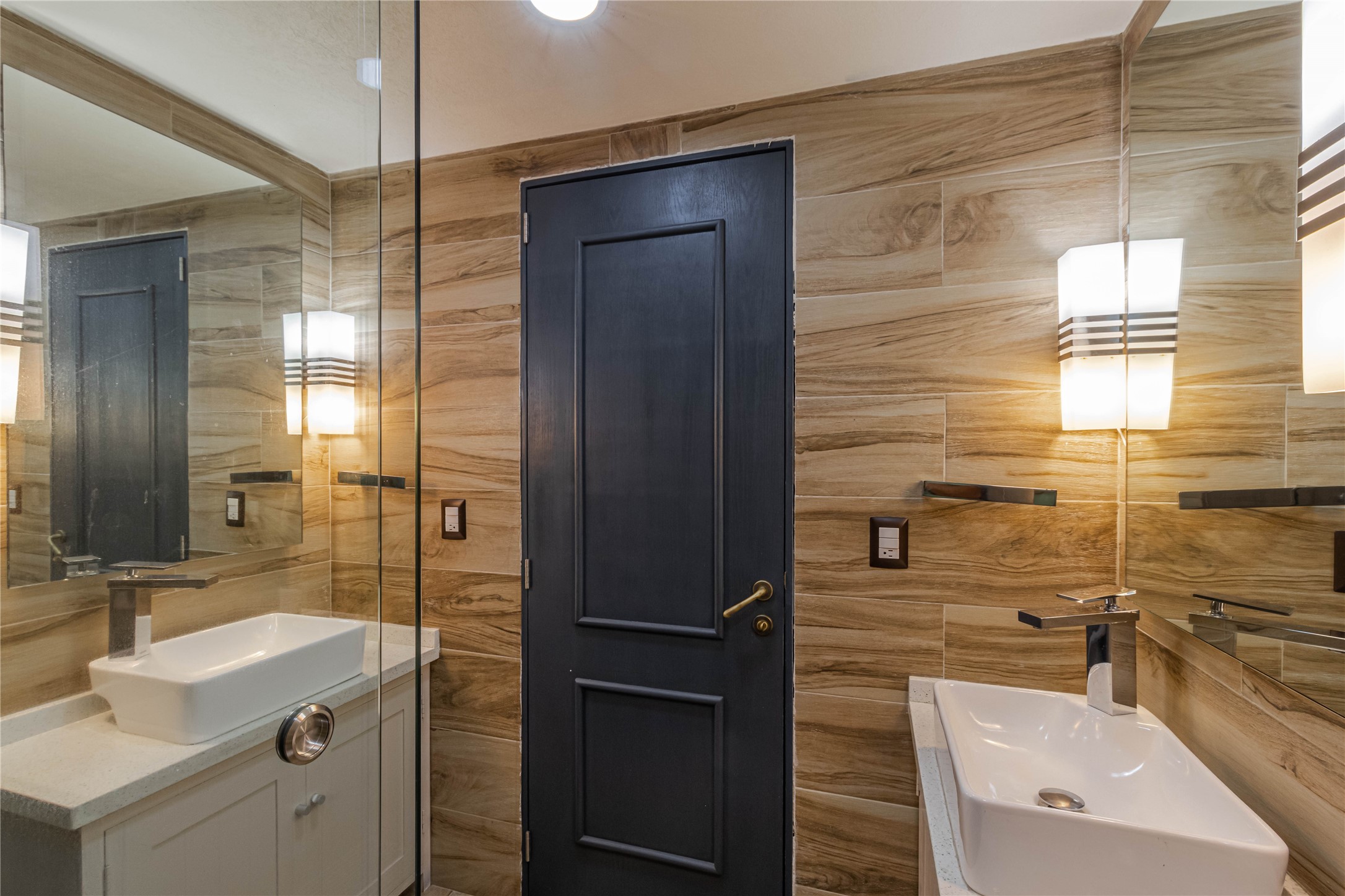 10 Cerrada Loma Nevada Remsenburg, NV 11960 - Photo 30 of 50 a bathroom with a sink a mirror and shower