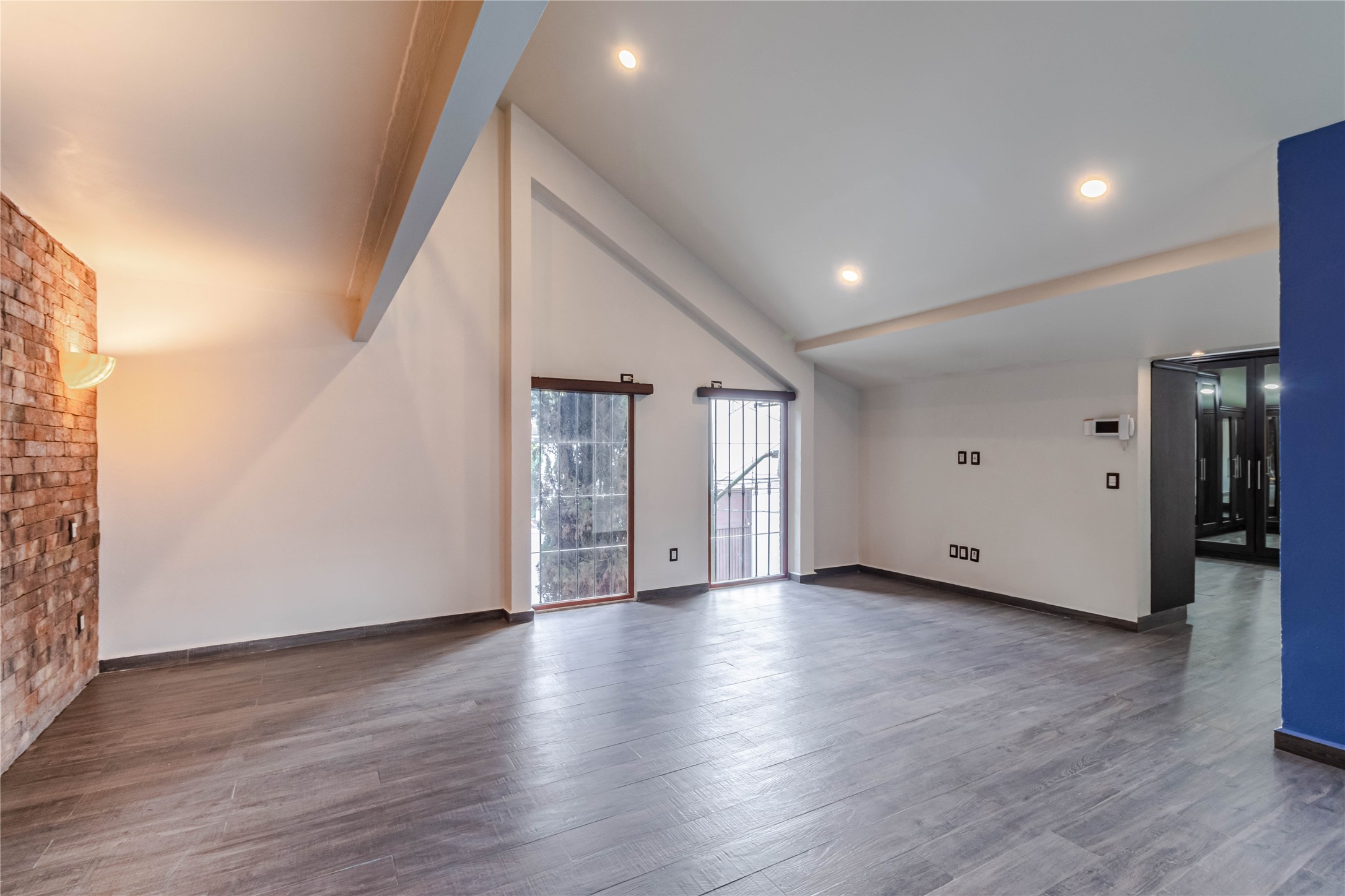 10 Cerrada Loma Nevada Remsenburg, NV 11960 - Photo 42 of 50 a view of an empty room with wooden floor and closet