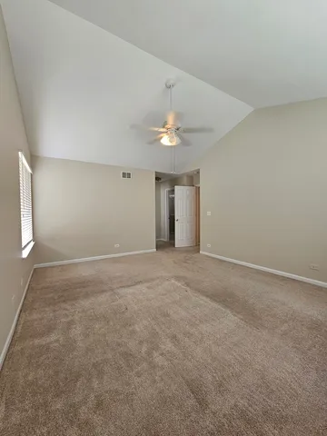 an empty room with shelves