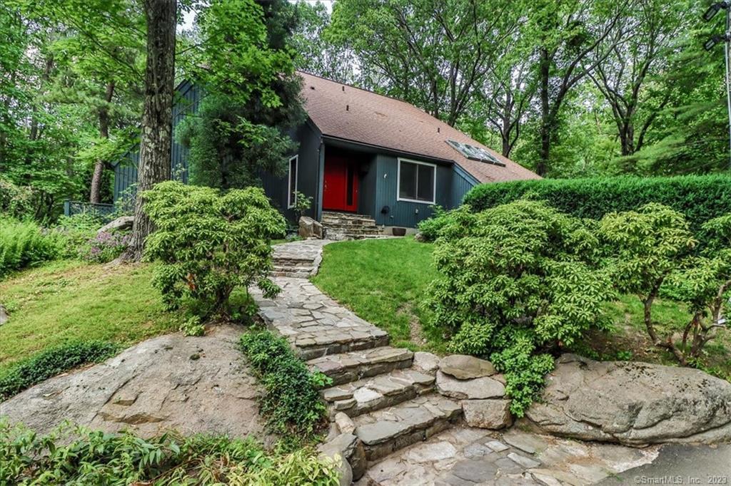 49 Seventy Acre Road Redding, CT 06896 - Photo 1 of 1 a view of a house with a yard