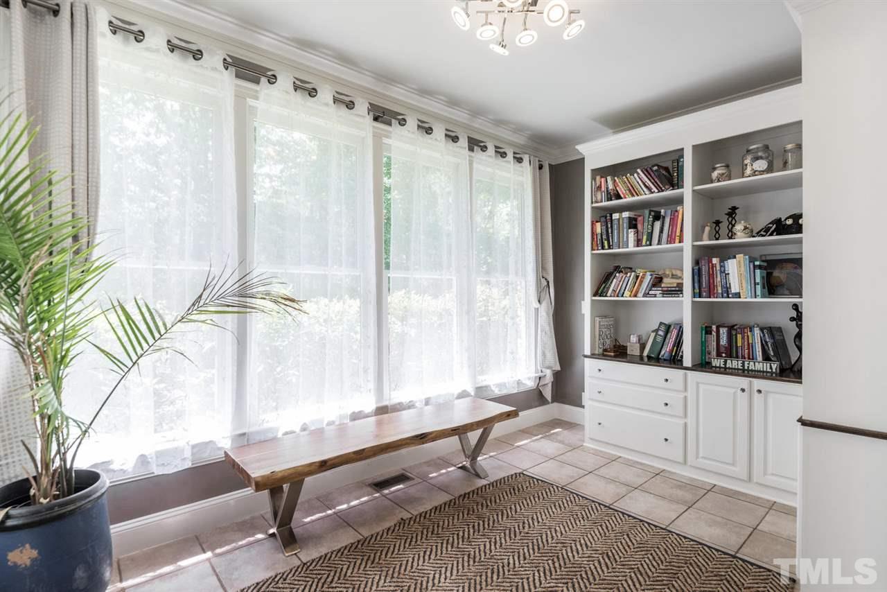 4407 White Chapel Way Raleigh, NC 27615 - Photo 12 of 25 Bright sunroom off the kitchen