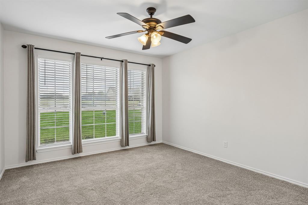 11090 Prairie Lakes Lane Forney, TX 75126 - Photo 21 of 40 a view of an empty room with a window