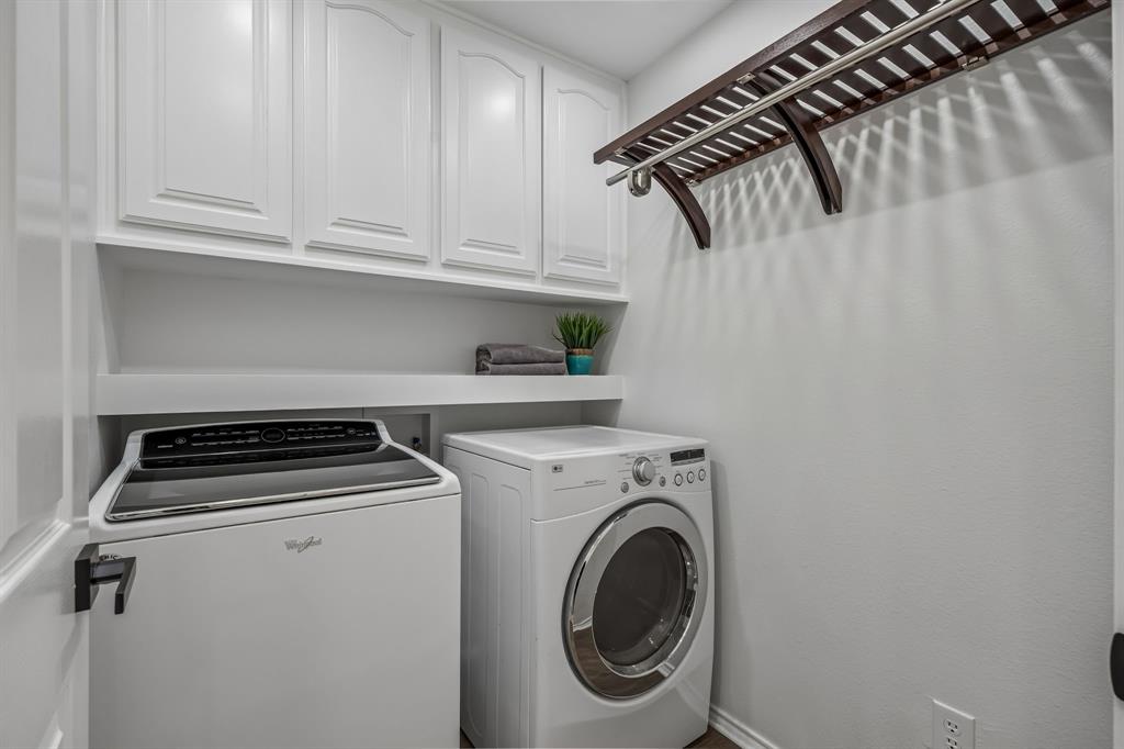 11090 Prairie Lakes Lane Forney, TX 75126 - Photo 27 of 40 a utility room with dryer and washer
