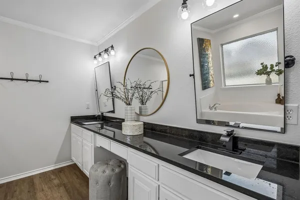 a close view of light fixtures and front door