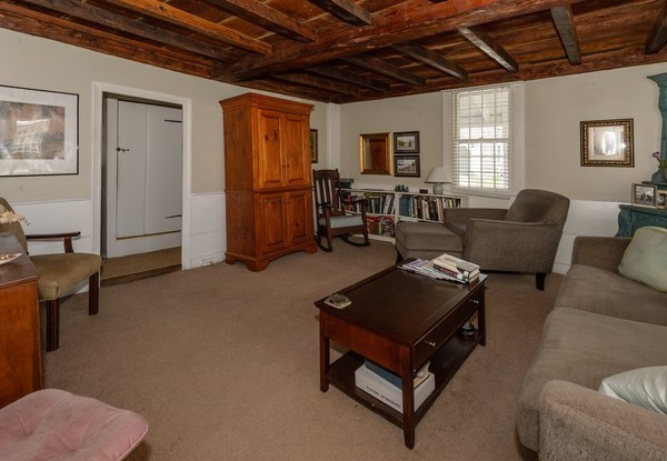 58 Summer Street Marshfield, MA 02050 - Photo 14 of 30 a living room with furniture gym equipment and a window
