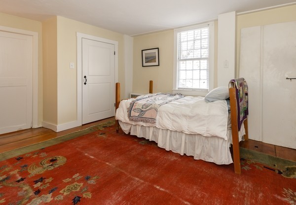 58 Summer Street Marshfield, MA 02050 - Photo 19 of 30 a bedroom with a bed and a window