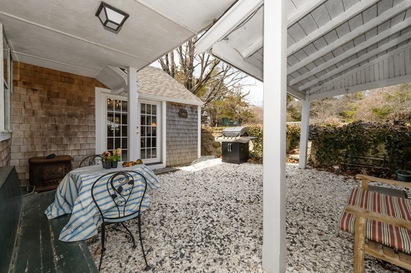 58 Summer Street Marshfield, MA 02050 - Photo 24 of 30 a view of balcony with two chairs and a table