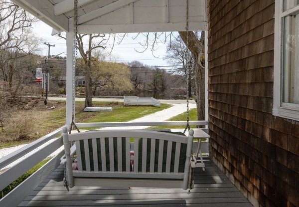 58 Summer Street Marshfield, MA 02050 - Photo 4 of 30 a view of roof deck with wooden floor and fence