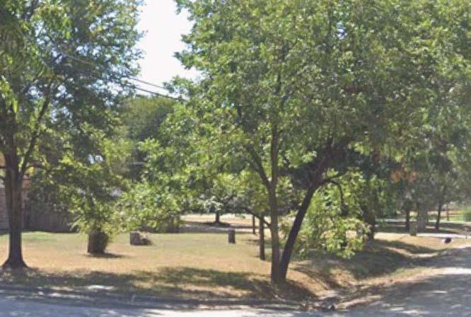 400 Martin Street Bonham, TX 75418 - Photo 2 of 3 a view of a yard with a tree